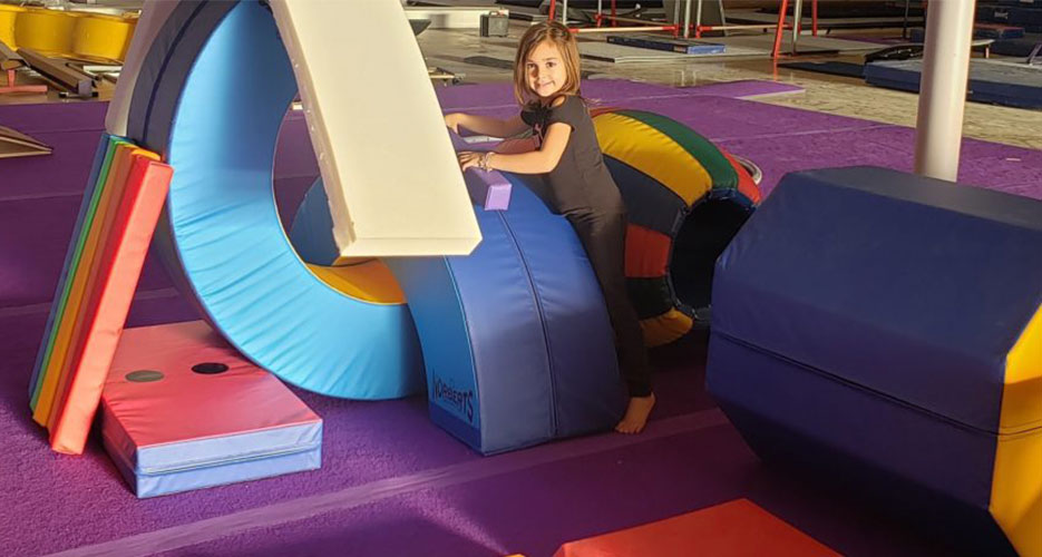 Child in Fun Fort Gymnastics Mats at Ultimate Sports Connection